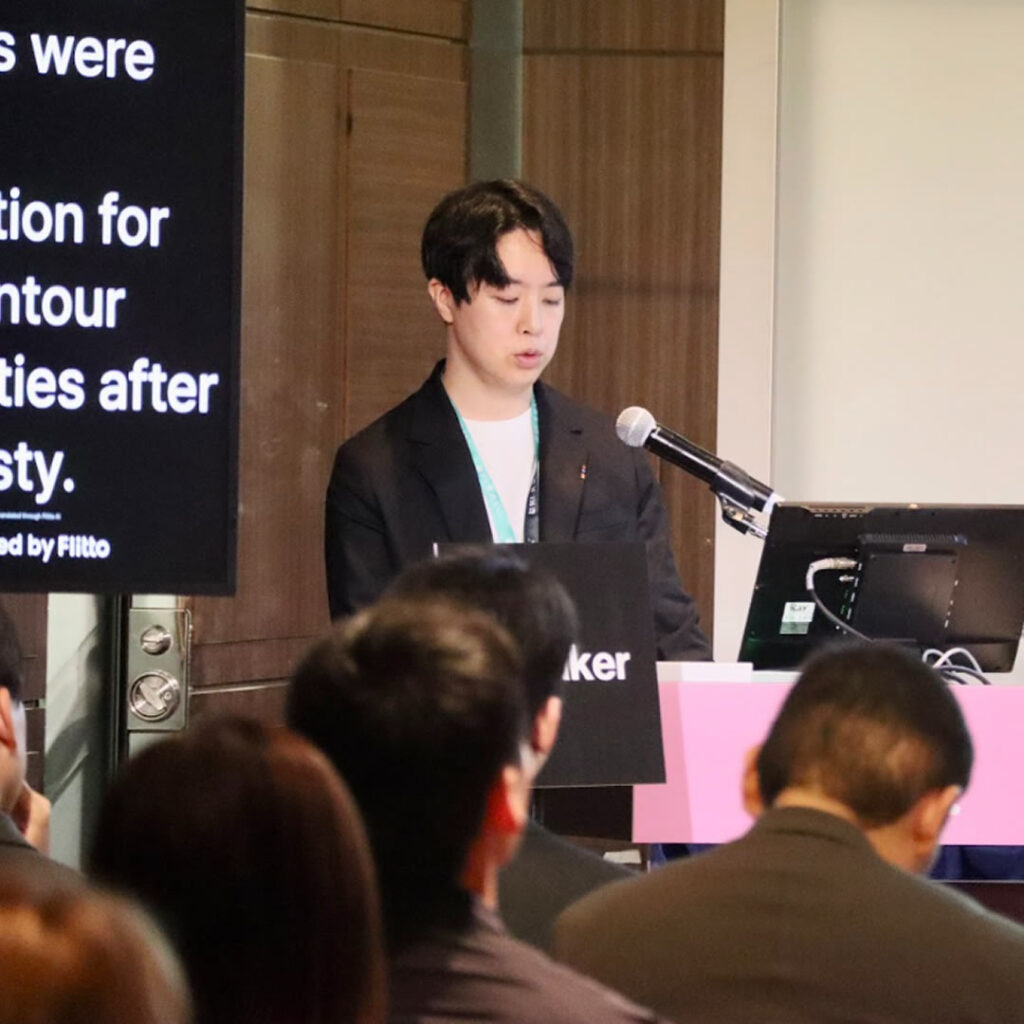 第5回美容アンチエイジング国際医学会で学会発表をする松村健太医師