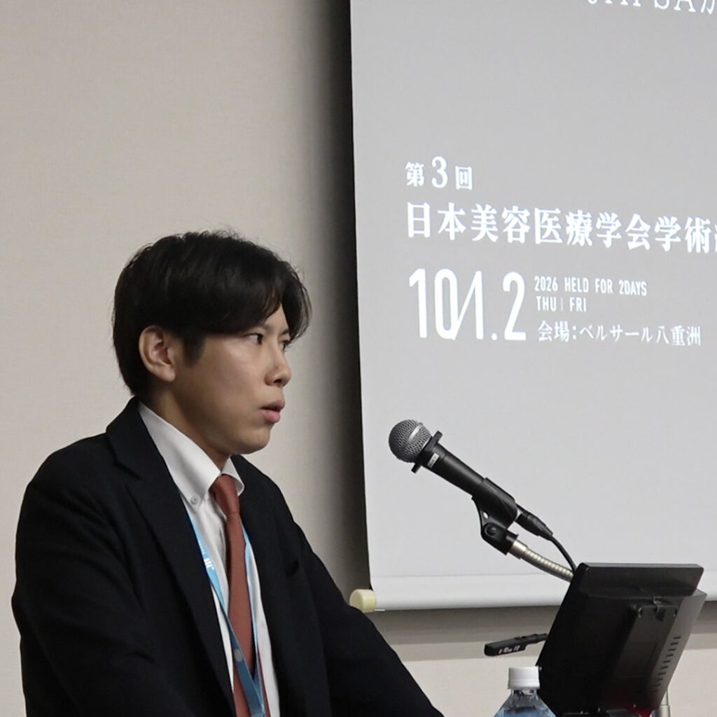 JASPAで発表している相原隆充医師